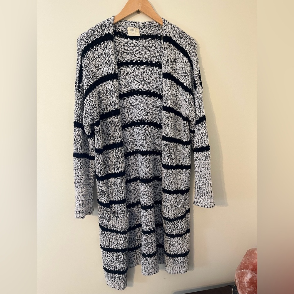 Black & white striped knit cardigan, size L.